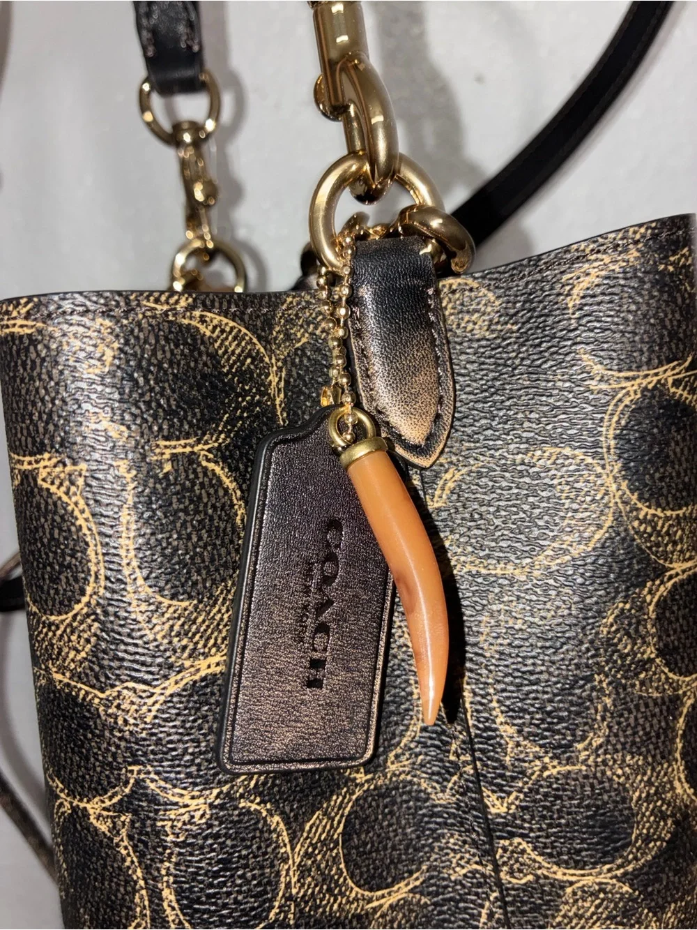 Coach Brown Signature Drawstring Crossbody Bucket Bag with Gold Hardware